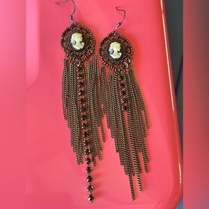 Cameo and chain dangle earrings